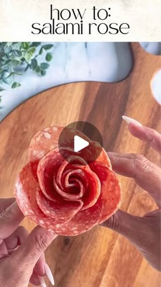 Kim Charon | Charcuterie & Things LLC on Instagram: "DIY: SALAMI ROSES 🌹   Tools: 2oz condiment cup and 11 salami slices  Layer: Place 5 slices halfway over the first one around the cup.   Create the bud: Fold 6 slices of salami in half with the rounded side up. Layer the folded slices on top of the other right to left.   Roll: Start rolling from one end to the other, securing the base as you go.  Finish: Gently spread the “petals” to create a rose shape.  PRO TIP: Mix and match different types of salami for added texture and flavor. 🌟  SAVE and FOLLOW @charcuterie_n_things for more cheese and charcuterie food styling tips!  #charcuterie #foodstyling #cheese #grazingtable #partyplanning #fooddesign #longisland #fyp #charcuterieandthings #easyappetizers #quickandeasy #CheeseBoard #Charcut Charcuterie Board Ideas Salami Rose, Cheese Slices Charcuterie, How To Fold Meet For Charcuterie, Prosciutto Rose How To, Cheese Flowers Charcuterie, Rose Salami Charcuterie, Folding Salami, Salami Flower Charcuterie, Folding Salami For Charcuterie