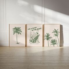 three framed art prints with palm trees on the wall in an empty room next to a wooden floor