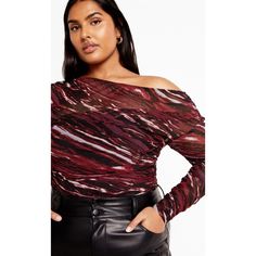 Make a bold fashion statement with our Mesh Miranda Print Top! Boasting an elastic bandeau inside and stylish long mesh ruched sleeves, this top is a true showstopper. With its flattering ruched sides, all-over mesh overlay, and hip-length hemline, it's the perfect choice for adding a touch of drama to your look while maintaining an edgy vibe. Bold and fiercely fashionable, no one does plus size fashion like City Chic. Loved around the globe for its diverse range of fashion-forward styles for an Ankle Heel Boots, Fitting Skirt, Tiered Tops, Mesh Overlay, Under Dress, Date Night Dresses, Plus Size Top, Fit N Flare Dress, Chic Woman