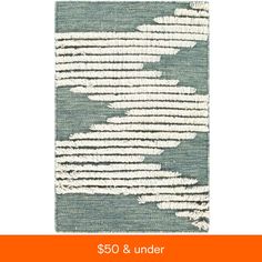 an image of a rug with white and green stripes on it, which reads $ 50 & under