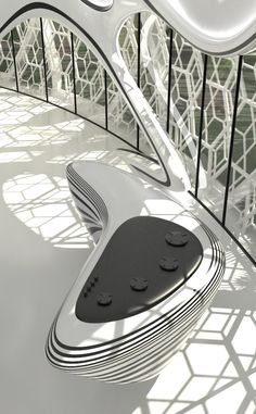 the interior of a modern building with white and black designs