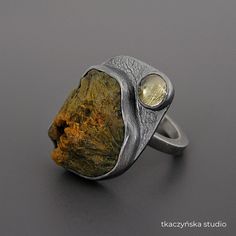 "Raw Jasper and Citrine Ring, Rough Gemstone Textured Ring, Organic Pattern Cocktail Ring, Big Contemporary Rustic Ring, Unique Massive Ring Massive ring with two stones: cabochon cut from a yellow and green raw jasper rock and a tiny citrine. Deep gray patinated.  Unique and organic. Materials:  Sterling silver (925 silver), jasper, citrine Dimensions of the stones: jasper 20 x 16 (25⁄32 x 5⁄8 in), citrine 6mm (15⁄64 in) Dimensions of the ring: width 25 x 18 mm (63⁄64 x 45⁄64 in), the width of the band 2,5 mm (3⁄32 in) Weight: 10,3 g (0,36 oz) Size:  internal diameter 16,76 mm (21⁄32 in) Size:  Europe 13,  Great Britain M,  USA 6¼, France 53, Germany 16½, Japan 12 Please check out the detailed size charts for S, M, and L sizes in the last photos.  The ring is not adjustable, but its size Bezel Set Rings, Jasper Rock, Rough Gemstone Jewelry, Rock Ring, Jewlery Rings, Rock Rings, Raw Stone Jewelry, Rustic Ring, Rough Jewelry