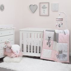 Set the stage for a stunning nursery with the NoJo Ballerina Bows Crib Bedding Collection! The convenient four piece crib set includes a comforter, fitted sheet, crib skirt and storage container, everything you need to create a beautiful nursery look for your little girl! Featuring elegant crib bedding and nursery dcor in shades of pink and sparkling grey with textures including dobby dots and tulle. This ballet-themed set is definitely on point! Neutral Crib Bedding, Gender Neutral Crib Bedding, Gender Neutral Crib, Neutral Crib, White Crib, Bows Pink, Pink Everything, Baby Crib Bedding, Beautiful Nursery