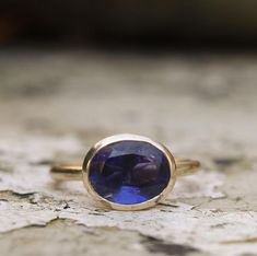 This lovely 10 x8 mm oval iolite is set in recycled 9ct yellow gold. The ring is designed to stack with other rings either on one finger or across the hand. Iolites are a great alternative to sapphires if you want a larger stone and sapphires are out of budget.This one is over 3cts.The ring is made to order in the size you need, just leave details of ring sizes at the checkout.Orders take 2-3 weeks.For other similar stacking rings with different stones go to:www.etsy.com/shop/karenjohnsondesigno Infinity Diamond Ring, Silver Pearl Ring, Gold Stacking Ring, One Finger, Silver Stacking Rings, Infinity Ring, Diamond Ring Settings, Orange Sapphire, Gold Ring Stack