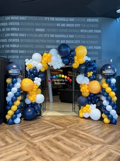 an arch made out of balloons on the floor