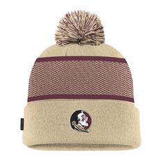 Get your young fan ready for the season with this Florida State Seminoles 2024 Sideline Peak Cuffed Knit Hat with Pom from Nike. This cuffed knit hat features embroidered graphics with raised details, showcasing the iconic Florida State Seminoles logo with intricate stitching. Topped with a playful pom, this hat effortlessly combines style and team spirit.  Made from 100% acrylic, the knit design offers warmth and comfort, ensuring your young fan stays cozy while cheering on the Seminoles. Nike Winter Beanie Hat, Florida State Seminoles Logo, Nike Gold, Florida State Seminoles, Florida State, Custom Embroidery, Knit Hat, Team Spirit, Knitting Designs