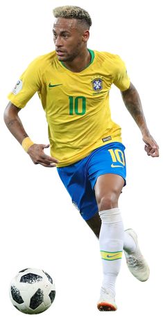 a man in yellow and blue is kicking a soccer ball