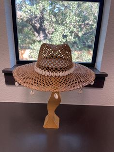 Wide brim straw cowrie seashell western summer cowgirl/cowboy hat. Please note each item is handmade so may have minor imperfections, but is constructed to the best of my ability. Thank you for understanding! White Bohemian Panama Hat For Beach, Western Style Paper Straw Hat For Beach, White Bohemian Panama Hat For Beach Season, Adjustable Paper Straw Hat For Festivals, Handmade White Straw Hat For The Beach, Coastal Style Hat With Curved Brim For Festivals, Bohemian White Straw Fedora, White Bohemian Straw Fedora, White Western Panama Hat For Beach