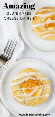 two white plates topped with cookies covered in glaze and icing next to a fork