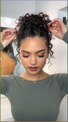 Formal Curly Bun Hairstyles, Formal Messy Bun Curly Hair, Curly Clubbing Hairstyles, Curly Ballerina Bun, Curly Bun With Braids, Braids To Bun Hairstyle, Short Curly Bun Hairstyles, Formal Curly Bun, Curly Hair Pulled Back Styles