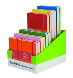 a stack of assorted colored notebooks sitting on top of each other in a box