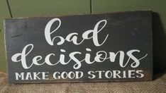 a wooden sign that says bad decision make good stories on the side of a wall