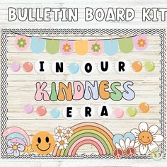 the bulletin board kit includes an image of a rainbow, flowers and a smiling face