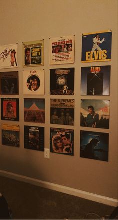 the wall is covered with various movie posters