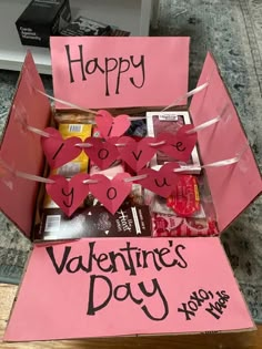 a valentine's day box with candy and candies in it