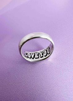 A hidden message of love. An alternative to the classic engraved ring. Made with 100% recycled 925 sterling silver.