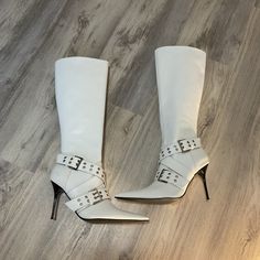 “Strut Your Stuff! These Knee High Boots Have A Vegan Leather Construction, Pointed Toes, Stiletto Heels, Wrapped Double Grommet Buckle Straps, And Side Zip Closures.” These Boots Are In New Condition. They Came Out Of A Pallet With A Bunch Of Dollskill Brand Shoes. So They Have A Little Bit Of Scuffs & Very Minimal Dents. Please Feel Free To Make An Offer! Retail: $128 Sold Out In This Color/Size New Without Box Size: 10 Color: White Brand: Generation Kiss X Dollskill Brand Womens White Boots, Dolls Kill Shoes, White Boots, White Brand, Brand Shoes, Shoes Heels Boots, Shoe Brands, Knee High Boots, High Boots