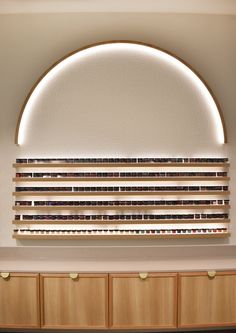 an arched window with wooden slats on the side and blinds in front of it