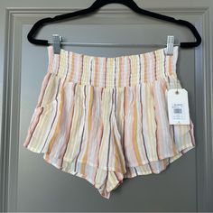 Size Large/12. Never Worn! High Waist Yellow Beachwear Bottoms, Striped Beachy Bottoms For Spring, Beachy Striped Bottoms For Spring, High Waist Yellow Shorts For Beach, Beachy Striped Spring Bottoms, Multicolor Beachy Shorts, Spring Beachy Striped Bottoms, Trendy Yellow Shorts For Beach Season, Yellow Summer Shorts For Vacation