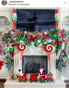 a fireplace decorated for christmas with candy canes and decorations