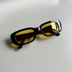 Black Frame With A Yellow Lense These Glasses Are Unisex :)! Uva Uvb Protection Brand New Modern Rectangular Yellow Sunglasses, Modern Yellow Rectangular Sunglasses, Yellow Rectangular Sunglasses With Gradient Lenses, Yellow Rectangular Sunglasses With Uv Protection, Yellow Square Frame Sunglasses For Beach, Rectangular Yellow Sunglasses For Summer, Yellow Rectangular Sunglasses For Summer, Trendy Rectangular Yellow Sunglasses, Trendy Yellow Rectangular Sunglasses