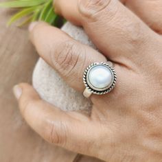 * Product Information Natural Pearl Ring, Handmade Silver Ring, 925 Sterling Silver Ring, Round Fresh Water Pearl Ring, June Birthstone Promise Ring Gift for her ✦ M E T A L : Sterling Silver 925 Handmade item Materials: Silver, Stone Gemstone: Pearl Gem color: White Band color: Silver Style: Boho & Hippie ✦ S T O N E : Fresh Water Pearl ✦ B I R T H S T O N E : June Description Indian Pearl Silver Ring, Gemstone Pearl Jewelry,925 Sterling Silver Ring Indian Jewelry, Silver Ring, Christmas Gift. Adjustable Pearl Birthstone Ring, Everyday Silver Pearl Ring, Everyday White Rings Stamped 925, Everyday White 925 Stamped Rings, Sterling Silver Pearl Birthstone Ring, Sterling Silver Pearl Ring With Gemstone, Fresh Water Pearl Ring, Birthstone Promise Rings, Natural Pearl Ring