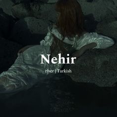 a woman sitting on top of a rock covered in water next to the words nehir