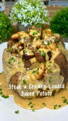 steak and chicken loaded baked potato with gravy