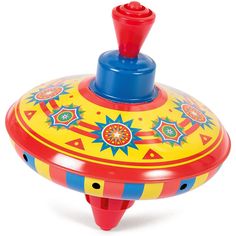 a toy flying saucer with colorful designs on it's body and red top