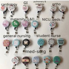 a bunch of badges that are attached to a white board with words on them and some type of name tags