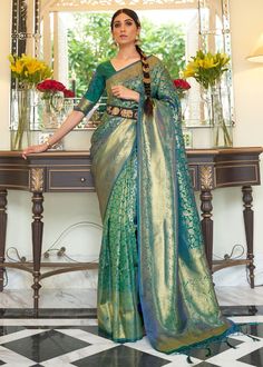 DEEP SEA GREEN KANJIVARAM SILK 204005 Desc: A bespoke saree with surreal charm in radiant shade with intricate zari work all over the drape. we added a touch of glamour with a stunning palla and tassel . Ideal for any special occasions!Saree Length : 5.5 meterBlouse Piece :  0.8 meterFabric : Blended kanjivaram silk . With Express Free Shipping Buy Indian Party wedding wear Kanchipuram Silk Saree DEEP SEA GREEN KANJIVARAM SILK 204005 online in USA, UK and Canada from KollyBollyEthnics.com Buy Designer Sarees Online, Kanjivaram Sarees Silk, Indian Bridal Sarees, Kanjivaram Silk Saree, Handloom Fabric, Wedding Saree Indian, Green Saree, Art Silk Sarees, Saree Trends