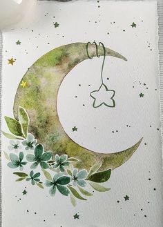 a watercolor painting of a crescent moon and flowers