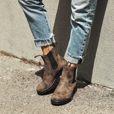 The iconic styling of Blundstone boots has been given a touch of flair with the women’s 1351 High Top Boot. Brogue accent detailing adds a feminie twist to this long loved classic boot. Fashionable in all situations, this boot will carry you through any season in style and comfort. Try this design with cuffed jeans in the fall, and cute linen shorts in the spring. Features: Rustic brown premium water-resistant leather Black elastic side Classic brogue detailing Leather lined Removable footbed Cu Blundstone Women, Womens Casual Boots, Blundstone Boots, Brown Boots Women, Botas Chelsea, High Top Boots, Shoes Boots Ankle, Suede Leather Boots, Leather High Tops