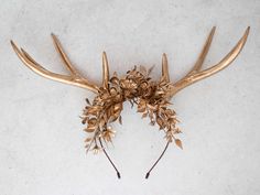 This beautiful antler headband is a lovely accessory, perfect for a party or photo-shooting session. Our stunning faux flowers look like the real. Head circumference:  one size fits all (adjustable) / fits adults Antler Headdress, Deer Antler Headband, Faun Costume, Antler Crown, Deer Antlers Headband, Gold Deer, Antler Headband, Floral Headband, Deer Antler