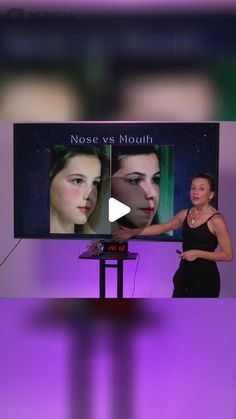 a woman standing in front of a purple screen with the words nose vs mouth on it