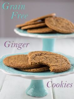 two plates with cookies on them sitting on a table