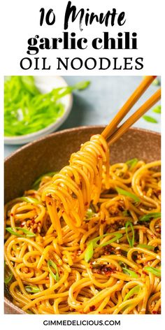 a bowl full of noodles with chopsticks in it and the title overlay reads 10 minute garlic chili oil noodles