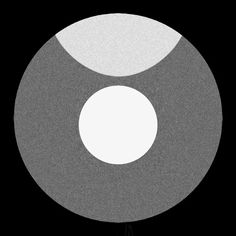 two circles in the middle of a black and white photo