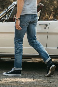 Our premium denim is inspired by the classic vintage blue jean. our premium japanese 4-way stretch selvedge denim story starts in japan where our fabric is developed at one of the oldest denim mills. we blend a unique 4 way stretch material with selvedge denim to create a specific amount of stretch and comfort you wouldn’t typically get with selvedge denim. this 360 degree of stretch gives the wearer comfort from every angle no matter what they are doing.    our 4-way stretch selvedge fabric is weaved using vintage shuttle looms. rolls of denim fabric are then brought into our workshop in los angeles where each pair goes through a 60 to 90 day process of cut sew washing and testing. with 4 fits available in multiple weights (see fit guide) and washes the style options are endless.    becau Bohemian Style Men, Outfit Reference, Jeans Outfit Men, Mens Attire, Comfortable Jeans, The Pen, Selvedge Denim, Converse Sneakers, Perfect Jeans