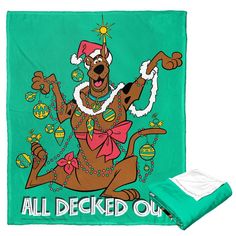 a green towel with an image of a dog on it and the words all decked out