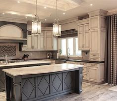 an image of a kitchen with white cabinets and granite counter tops on the front page