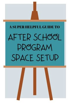 a blue sign with the words after school program space setup on it and an easel next to it