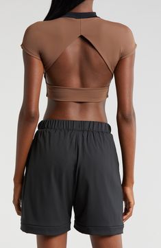 Cut from a double-layer knit with a banded hem, this cropped open-back T-shirt is supportive enough for the weight room and hot enough for the dance floor. Mock neck Short sleeves Nylon/spandex Machine wash, tumble dry Imported Versatile Cropped Sports Top, Sporty Short Sleeve Tops With Built-in Bra, High Stretch Seamless Crop Top With Short Sleeves, Compressive Casual Crop Top, Versatile Medium Support Crop Top, Seamless Crew Neck Crop Top For Gym, Compressive Cropped Casual Top, Versatile Cropped Gym Tops, Compressive Summer Crop Top