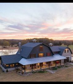 an aerial view of a large house in the country