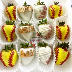 there are many strawberries decorated to look like baseballs and the words happy birthday written on them