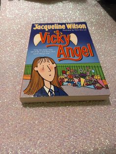 there is a book on the table that says, vicky angel's angel