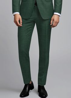 Define majesty anew with our Loro Piana Catalina Wool Silk Linen Pants, where handpicked designs meet tailored perfection. Crafted from a top-notch fusion of the finest wool, silk, and linen, this pant embodies quintessence. Its solid green hue boldly reflects the wearer's discerning taste and willingness to embrace daring fashion choices. Whether worn at prestigious soirées or in the commanding atmosphere of the boardroom, this masterpiece exudes unparalleled intricacy.   A marriage of elegance and comfort, Loro Piana fabrics are made using the highest quality raw materials in the world, in their purest form or blended together. A sophisticated response to the dictates of contemporary elegance, these fabrics lend themselves to a wide range of styles to meet the varied needs of today’s war Tailored Silk Tapered Leg Bottoms, Tailored Green Formal Bottoms, Green Tailored Formal Bottoms, Tailored Silk Bottoms With Tapered Leg, Tailored Green Bottoms For Formal Occasions, Fitted Wool Ankle-length Pants, Luxury Tailored Suit With Straight Pants, Formal Tailored Green Dress Pants, Tailored Green Dress Pants For Formal Occasions