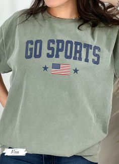 Comfort Colors Retro Star USA Graphic Tee, Comfort Colors Graphic Tee, American Graphic Tee, Retro USA Comfort Color Shirt, Summer Games Tee Custom made just for you! 💜Premium Comfort Colors Tee Shirt💜 Go Sports USA Shirt for her. Perfect comfort colors graphic tee. USA flag shirt for summer games. 2024 Summer Games Shirt. USA flag tshirt. Comfort Colors USA Shirt, USA Shirt for her. Perfect for watching the 2024 summer games. Oversized USA Shirt Gift for her.  😎We welcome customization so pl Sporty Cotton Tops With American Flag Print, Sporty Crew Neck Top With American Flag Print, Summer Games, Usa Shirt, Gaming Shirt, Comfort Colors Tee, Color Shirt, Flag Shirt, Comfort Color