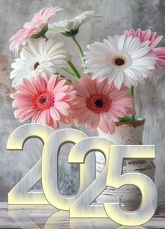 flowers in a vase with the number twenty five on it and the date 2055