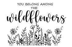 the words you belong among the wildflowers are in black ink on a white background